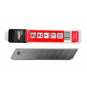 Utility knife with a red-labeled blade cartridge and a separate metal slotted replacement blade laid out beside it.